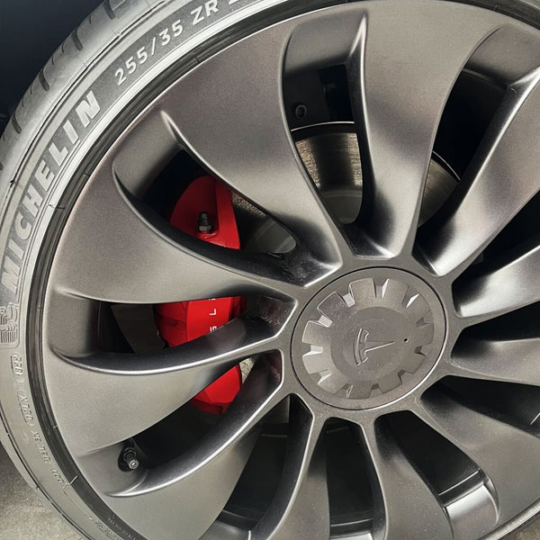 Mobile wheel repair on a dealership lot in Los Angeles